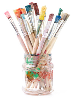 paint brushes in a jar